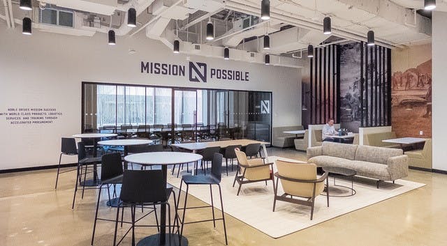 Lounge area at new Noble office featuring cafe and lounge seating.