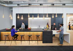 HGA's new Washington, D.C. Penn Quarter office features wood accents and high-contrast colors that were guided by the project's guiding principles of authenticity, welcoming, and curiosity. The arena is the core with a pantry area and collaboration room. HGA's new Washington, D.C. Penn Quarter office features wood accents and high-contrast colors that were guided by the project's guiding principles of authenticity, welcoming, and curiosity. The arena is the core with a pantry area and collaboration room.