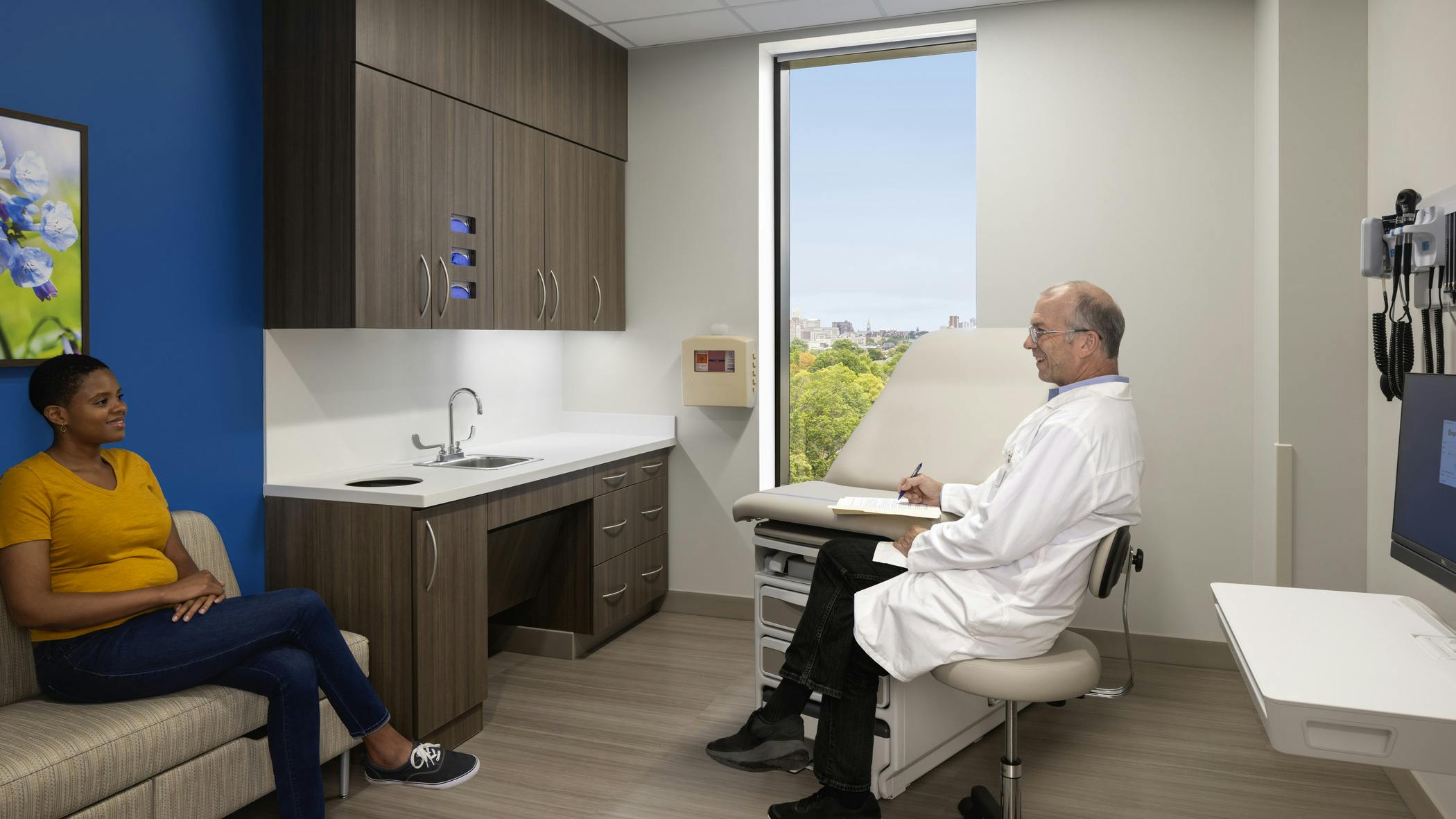 Gary C. Werths Building at Siteman Cancer Center - Patient consult room with doctor and patient