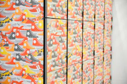 The Converse sneakers and hidden B design on the cabinets in the new Goodie Two Shoes Foundation office and warehouse. The Converse sneakers and hidden B design on the cabinets in the new Goodie Two Shoes Foundation office and warehouse.