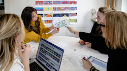 Perkins&Will employees designing a show for the 2025 ART on THE MART Perkins&Will employees designing a show for the 2025 ART on THE MART