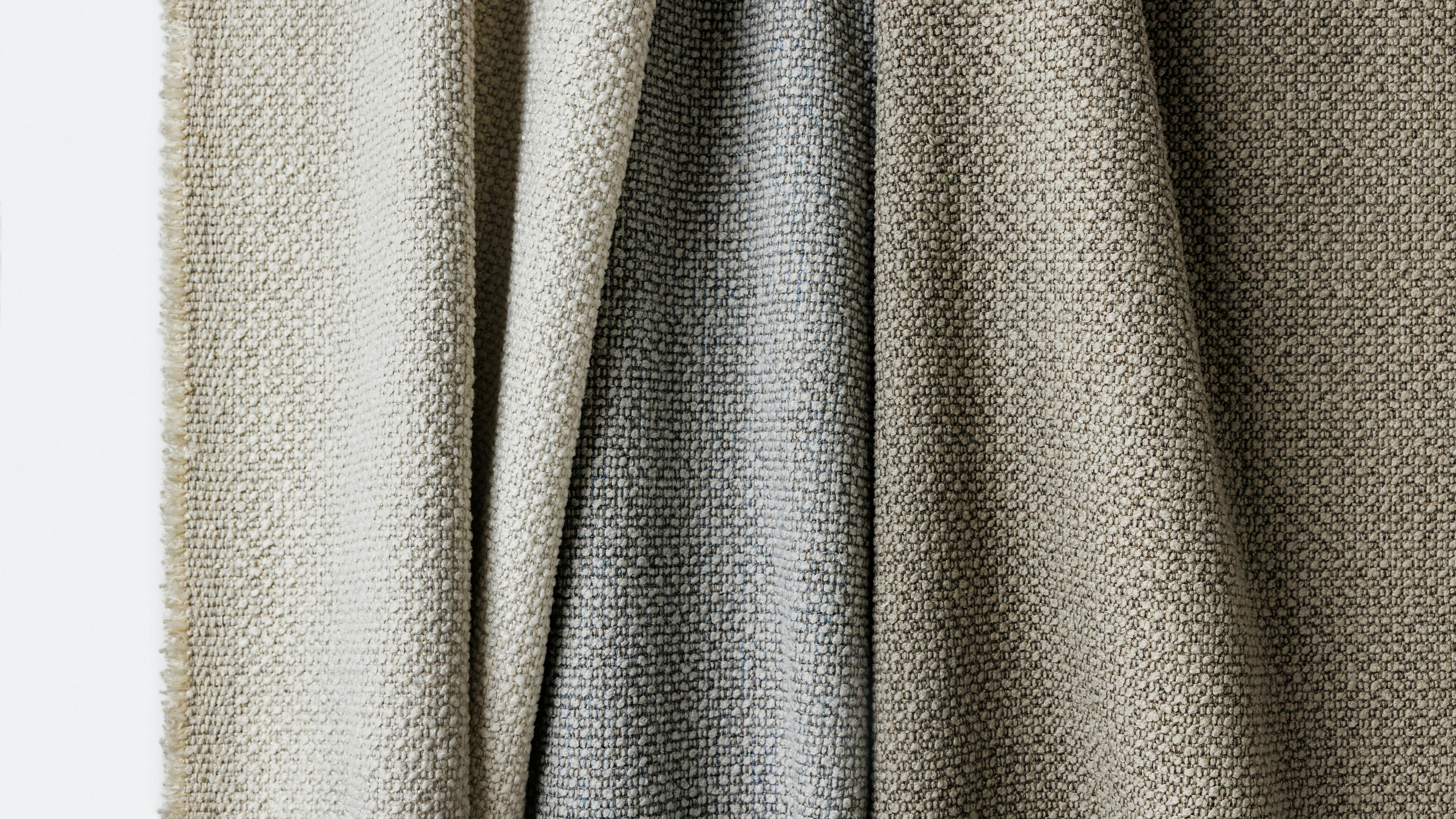 Surface Level features a weave structure with rows of polyester boucle and heathered olefin.