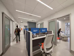 A central workspace with examination and treatment rooms branching off simultaneously. A central workspace with examination and treatment rooms branching off simultaneously.