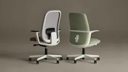 Backside view of two task and conference chairs with white frames and upholstered seat and back on casters. Backside view of two task and conference chairs with white frames and upholstered seat and back on casters.