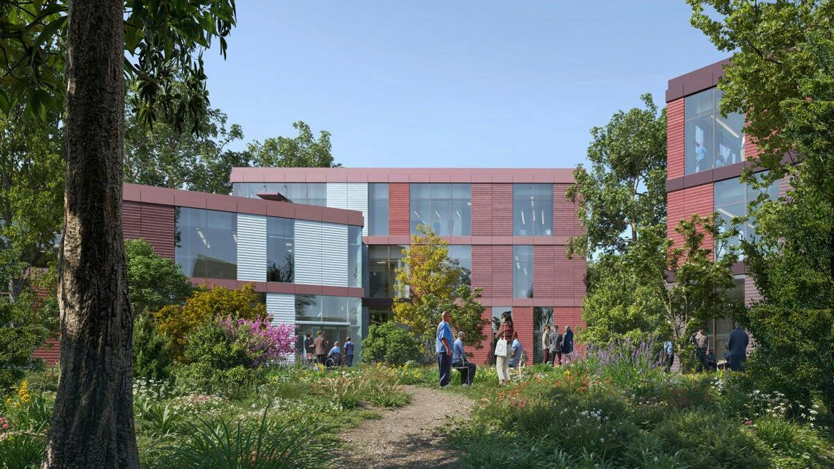 Exterior view of courtyard with people outside.