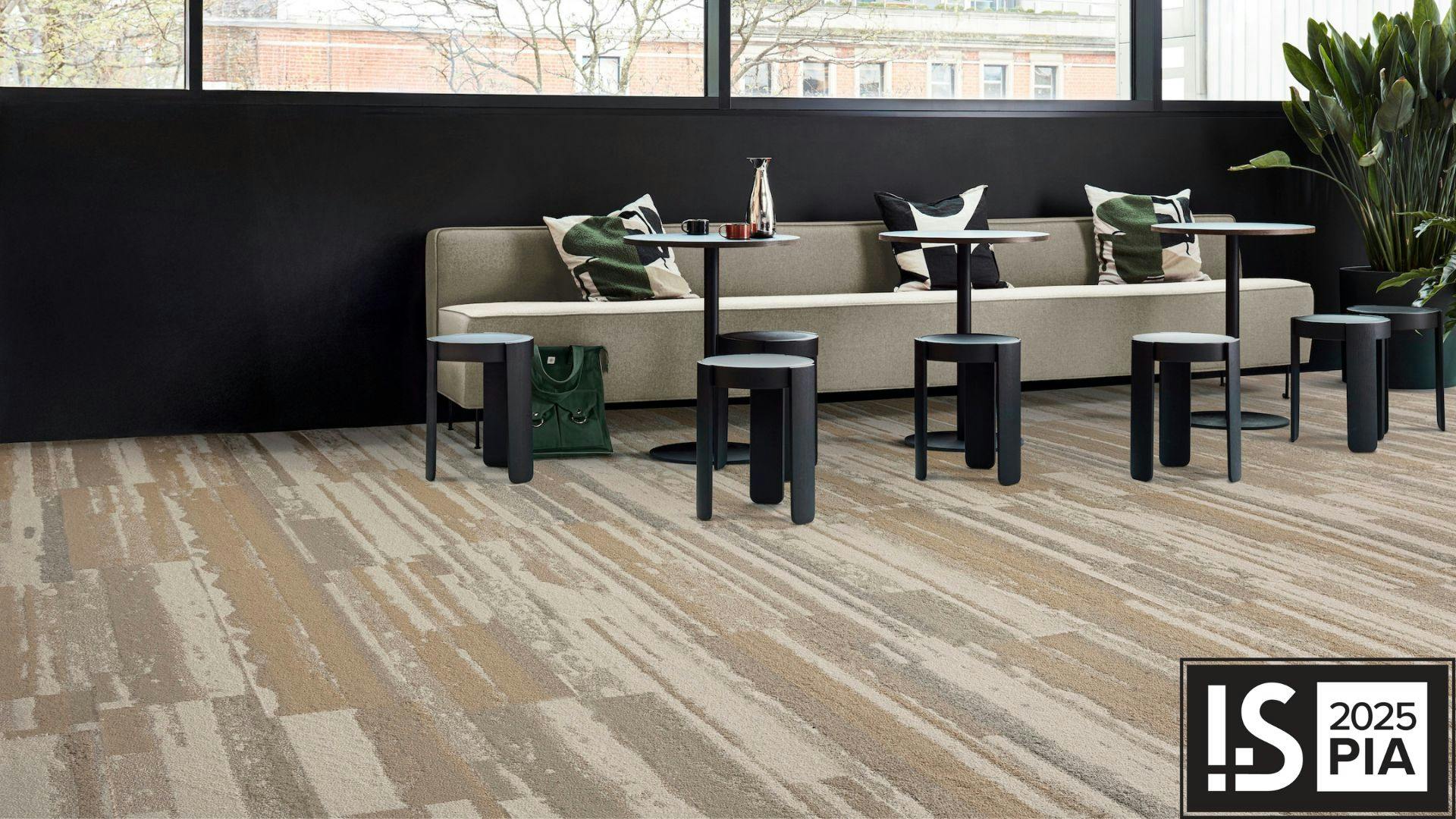 Interface's Stellar Horizons carpet tile installed in a large room.