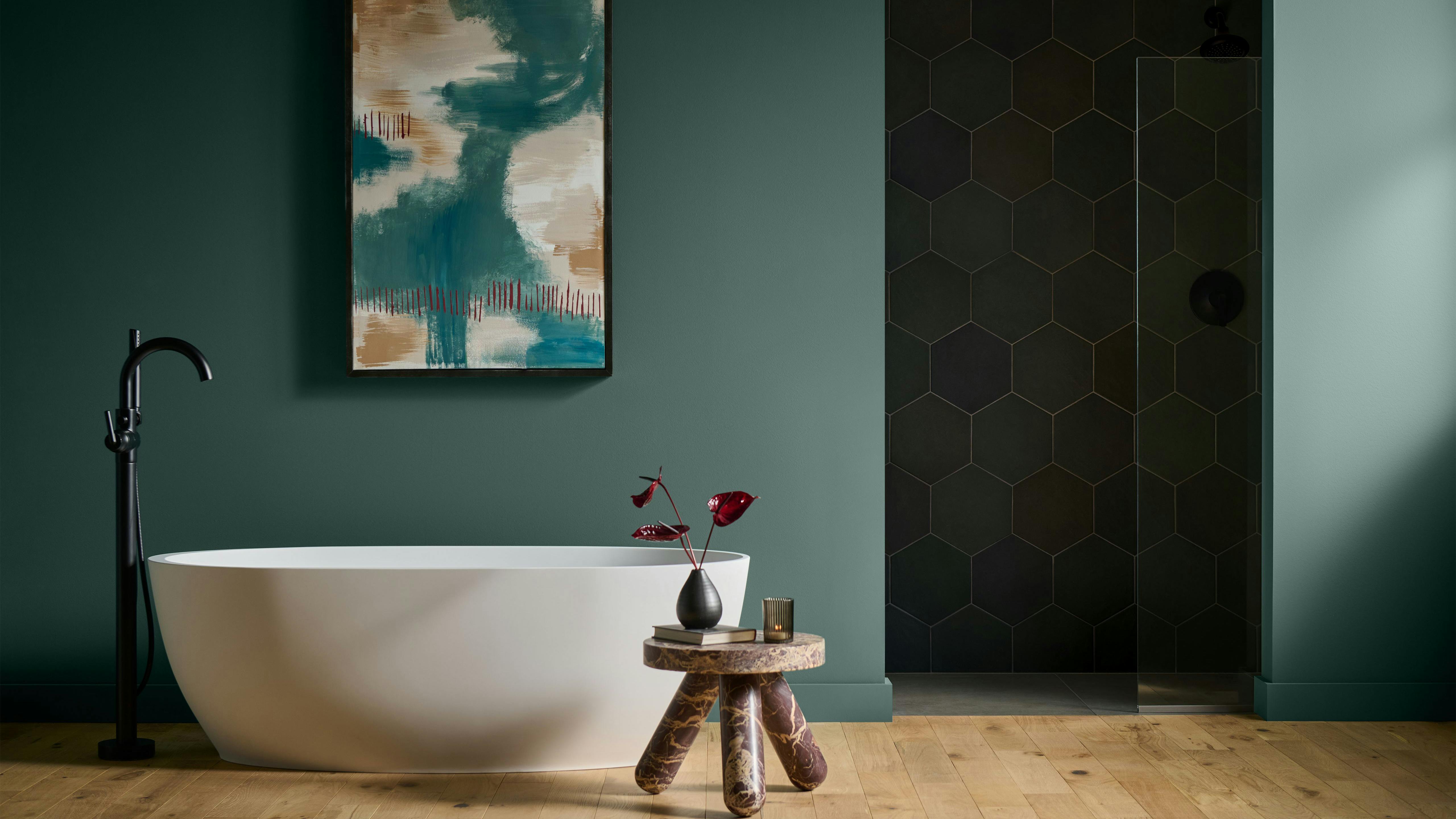 Behr Paint Company's 2026 Color of the Year is Hidden Gem, shown painted in a bathroom.