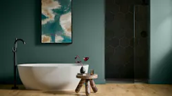 Behr Paint Company's 2026 Color of the Year is Hidden Gem, shown painted in a bathroom. Behr Paint Company's 2026 Color of the Year is Hidden Gem, shown painted in a bathroom.