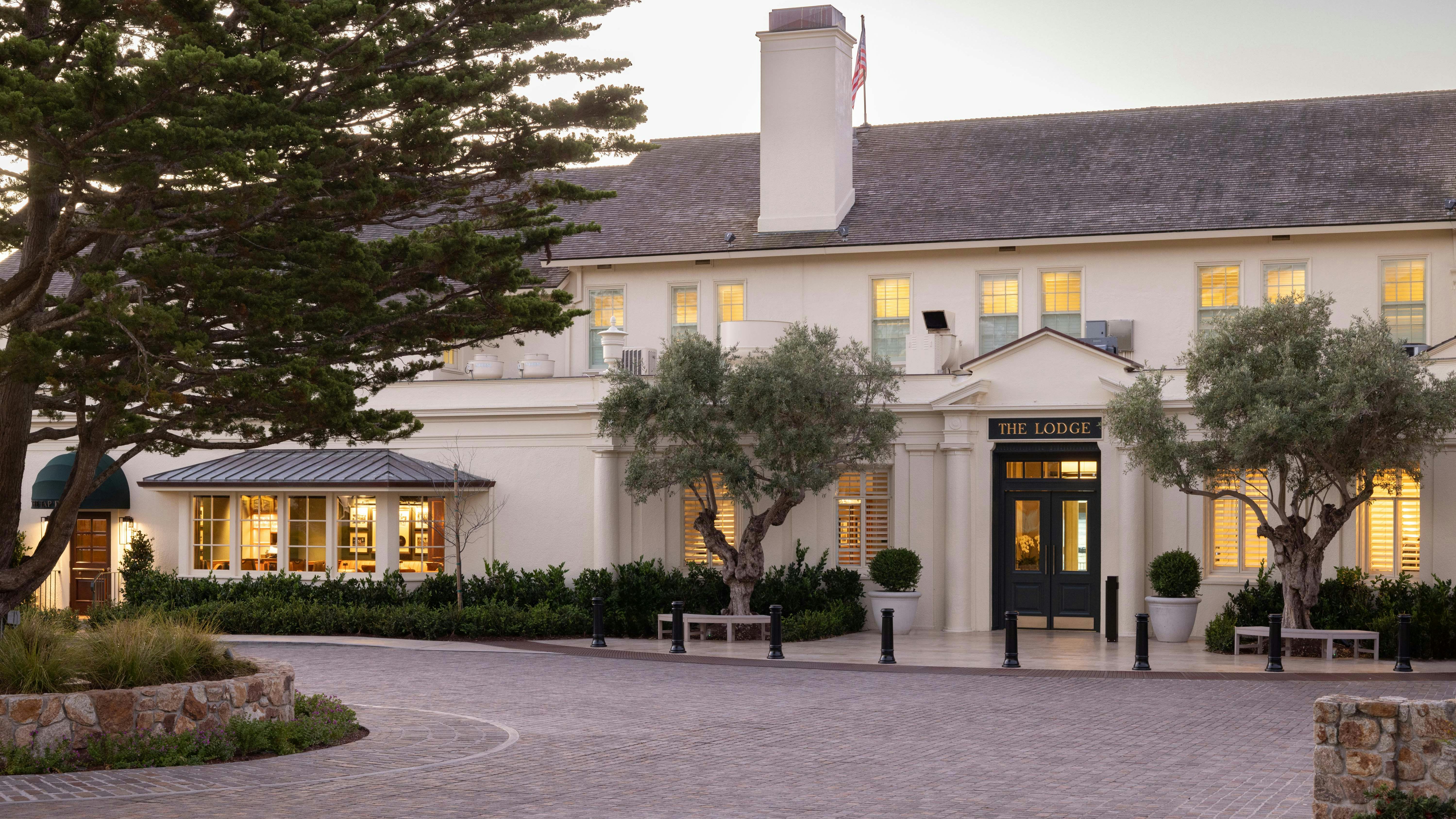 Exterior view of The Lodge at Pebble Beach overlooking the Pacific Ocean and the 18th green following a redesign by HBA San Francisco.