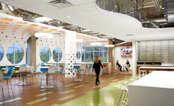 A workplace café and shared gathering space designed to support teamwork and flexibility maintains color and material palette continuity. A workplace café and shared gathering space designed to support teamwork and flexibility maintains color and material palette continuity.