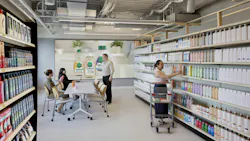 Unilever retail lab features personal care and beauty products on shelves, with focus-group consumers engaging with product and Unilever staff. Unilever retail lab features personal care and beauty products on shelves, with focus-group consumers engaging with product and Unilever staff.