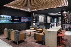 A custom ceiling fixture featuring baseball and softball bats graces the Bat Lounge upstairs. It serves double duty as a showpiece and as a way to conceal rerouted ductwork. A custom ceiling fixture featuring baseball and softball bats graces the Bat Lounge upstairs. It serves double duty as a showpiece and as a way to conceal rerouted ductwork.