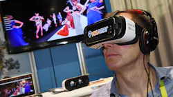 A CES attendee wears a Samsung Gear VR headset A CES attendee wears a Samsung Gear VR headset