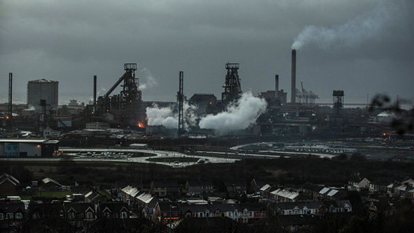 Steam rises from the blast furnaces at the Tata steel works in Port Talbot