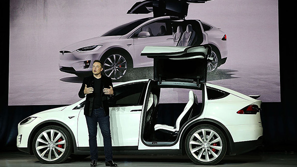 Tesla CEO Elon Musk introduces the Model X at a 2015 event