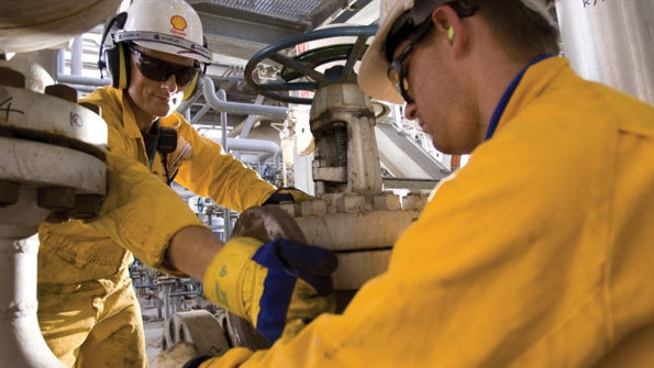 Shell Profits Down 14 for Year