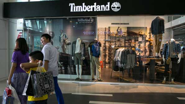 A new Timberland store is seen at the Junction Square mall in Yangon Myanmar Major international brands such as Chevrolet Ford and Coca Cola have started doing business in Burma taking advantage of the promising market and the country opening its doors to investment