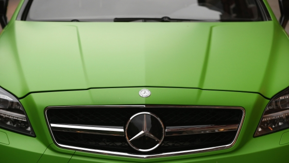 Green MercedesBenz vehicle