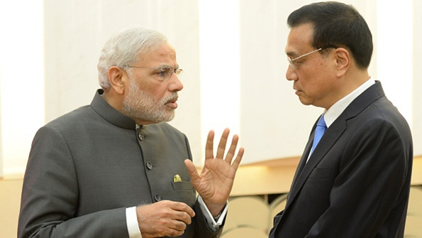 Indian Prime Minister Narendra Modi talks with Chinese Premier Li Keqiang after a press conference at the Great Hall of the People in Beijing China Modi is on a threeday state visit to China