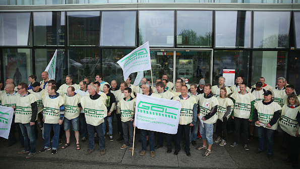These striking German rail drivers demonstrated outside a rail station earlier this month