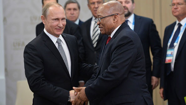 Russian President Vladimir Putin welcomes South African President Jacob Zuma to the BRICS summit