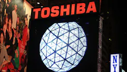 The Toshiba wordmark above a New Years Eve ball The Toshiba wordmark above a New Years Eve ball
