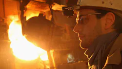 Molten iron flows into a furnace for purification and alloying at the ThyssenKru Molten iron flows into a furnace for purification and alloying at the ThyssenKru