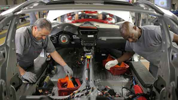 Workers assembled Porsche 911s at the Zuffenhausen Porsche production plant in Stuttgart Germany last March