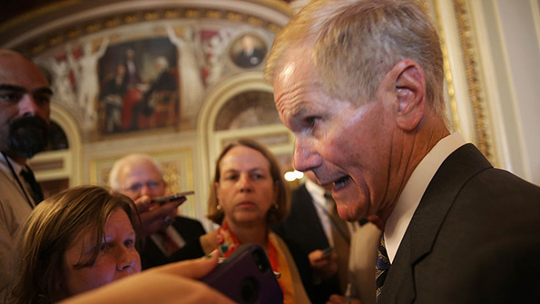 Senator Bill Nelson DFla speaks with reporters after a 2015 policy lunch