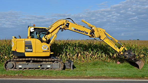 A Komatsu PC138 US at work on a roadside Komatsu will spend more than 35 million including debt to acquire Milwaukeebased Joy Global