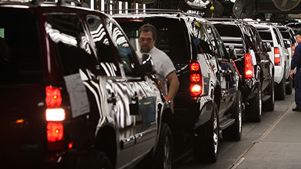 Workers at a GM Assembly plant