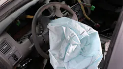 A deployed Takata airbag in a Honda sedan A deployed Takata airbag in a Honda sedan