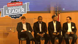 Four top GE leaders at a company symposium roundtable event Four top GE leaders at a company symposium roundtable event