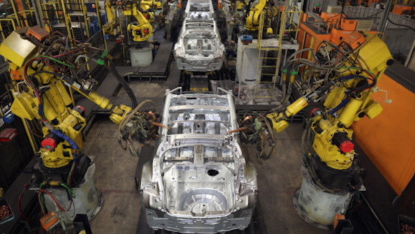 Robotic arms assemble and weld the body shell of a Nissan car on the production line at Nissan39s Sunderland plant in England