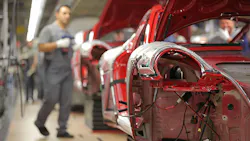 Au auto worker on the factory floor Au auto worker on the factory floor