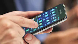 A user fiddles with the Samsung Galaxy S7 A user fiddles with the Samsung Galaxy S7