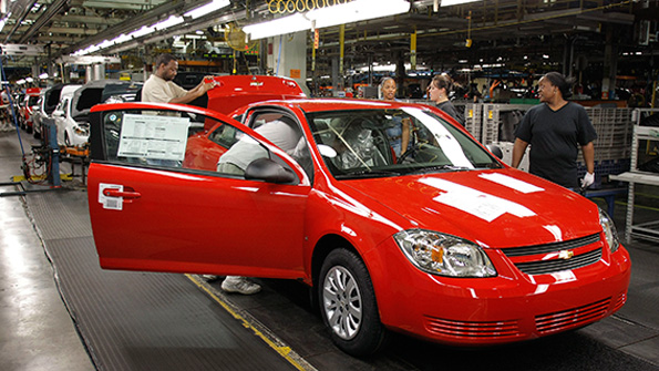 Workers at the GM plant in Lordstown Ohio assemble a Chevy Cobalt