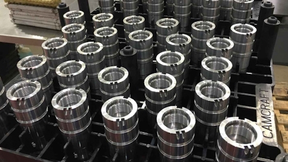 Fuel injector bodies lined up at the plant of Illinois automotive component supplier Camcraft