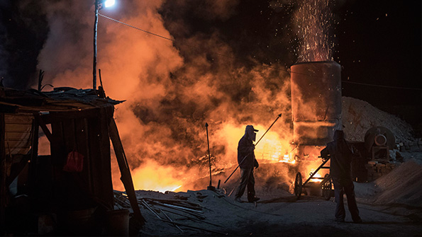 Chinese laborers work at a site in Inner Mongolia