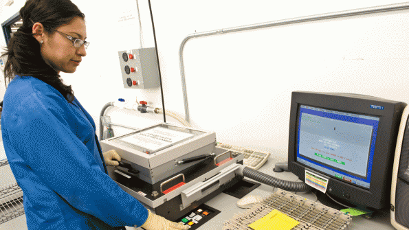 A Firstronic employee conducts an incircuit test of electronic assemblies