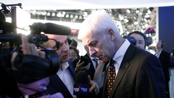 VW CEO Matthias Mueller fields questions from reporters