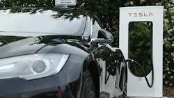 A Tesla vehicle charges at a station in Germany A Tesla vehicle charges at a station in Germany