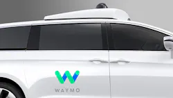 The Waymo logo on the side of a minivan The Waymo logo on the side of a minivan