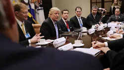 President Donald Trump and various manufacturing CEOs President Donald Trump and various manufacturing CEOs