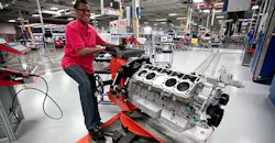 woman handling a car engine woman handling a car engine