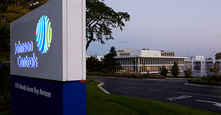 Headquarters at dusk with signage