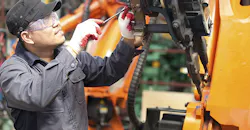 guy working on equipment guy working on equipment