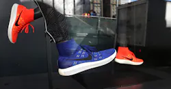 Nike shoes in store window Nike shoes in store window