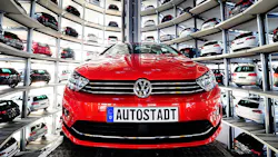 A Volkswagen sedan at the Autostadt in Wolfsburg. A Volkswagen sedan at the Autostadt in Wolfsburg.