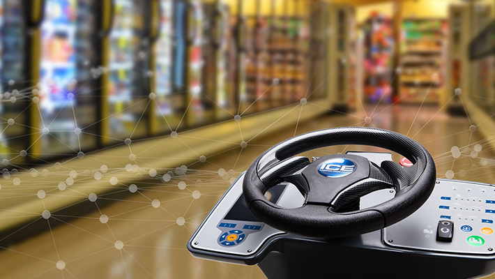 A robot running on Brain Corp. software cleans the floor of a grocery store.